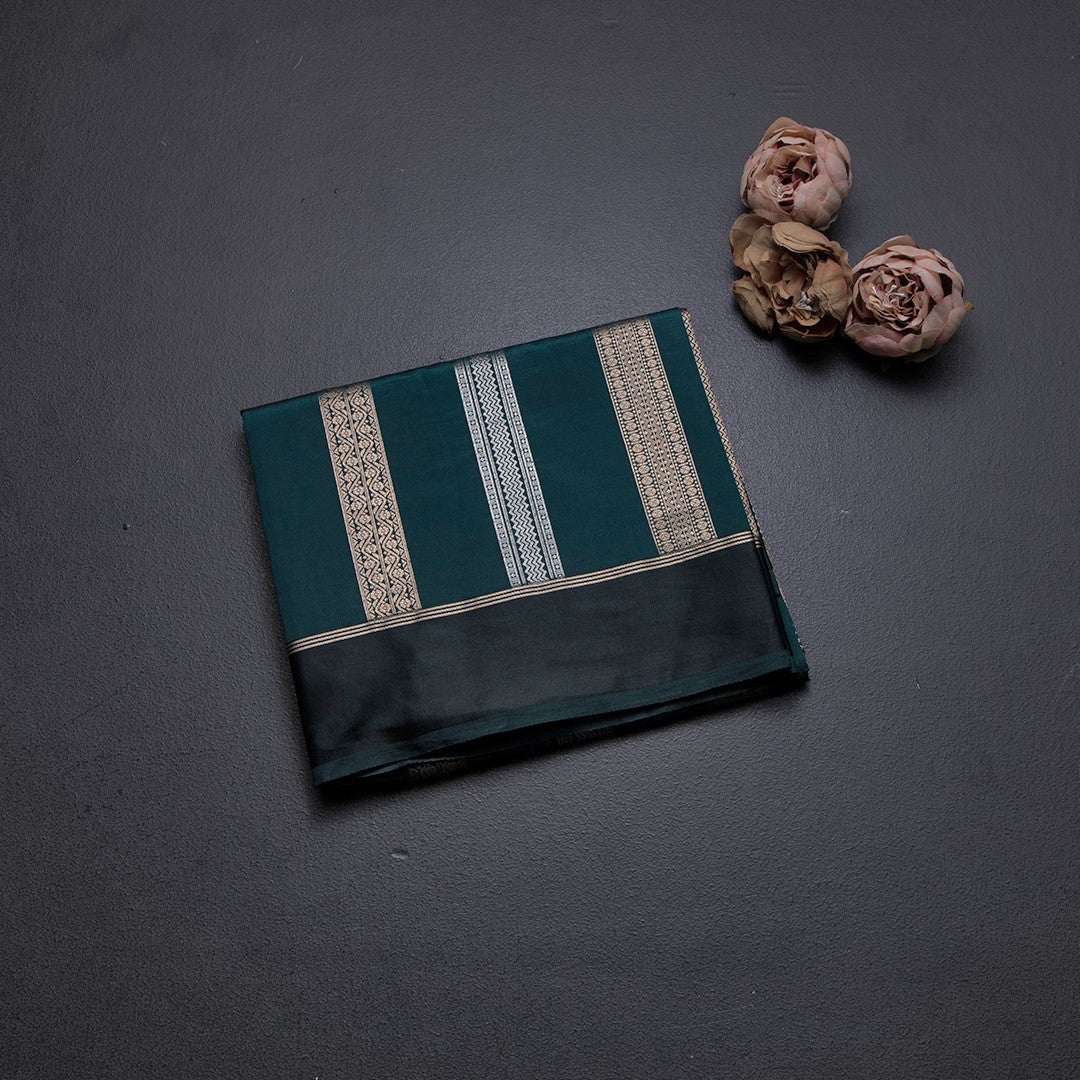 Raw Silk Teal Green Saree With Zari Stripes Design And Simple Border