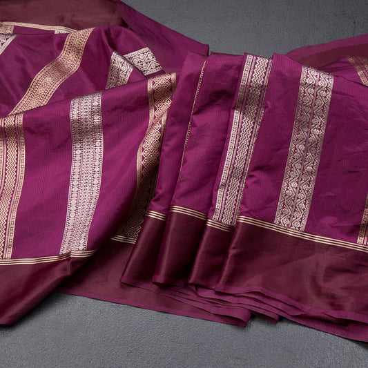 Raw Silk Magenta Purple Saree With Zari Stripes Design And Simple Border