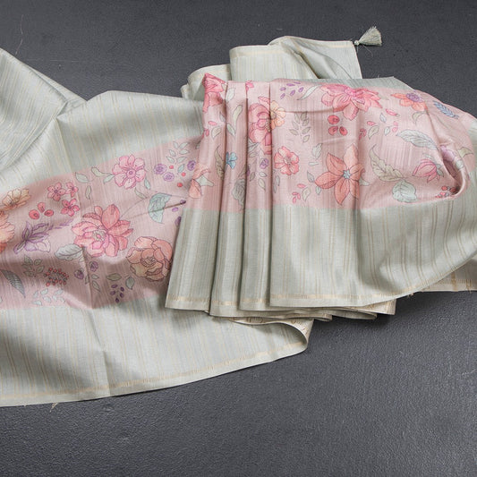 Tussar Pista Green Borderless Saree With Zari Stripes And Printed Design